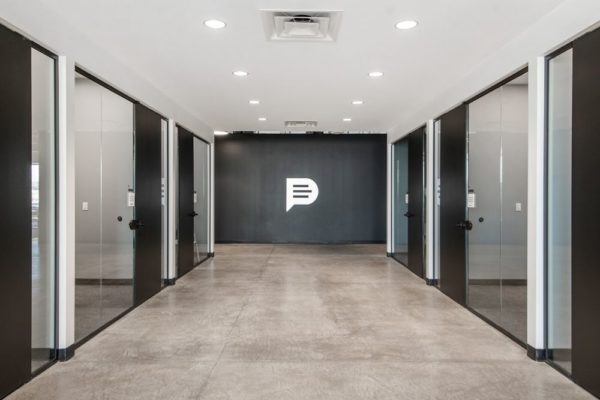 Podium logo display in commercial office hallway