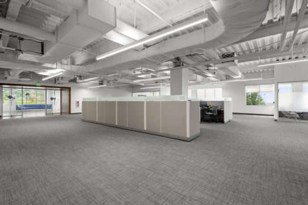 Open office space with a set of cubicles | Utah Commercial Real Estate