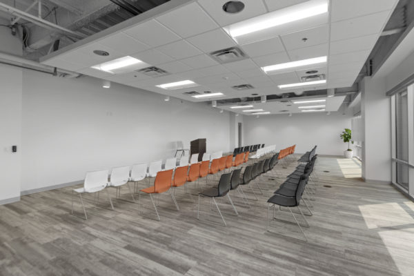 Large meeting room with rows of chairs | Utah Commercial Real Estate