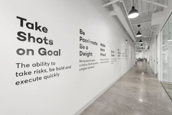 Wall with inspirational quotes | Utah Commercial Real Estate
